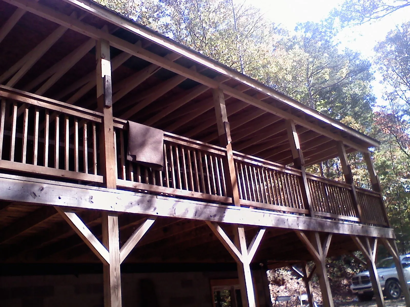 Timber framing under a new elevated porch and deck — Roof Leak Repair in South Heart by Roofing Brothers